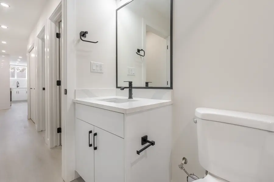 HavenNest legal basement suite interior — brand-new finishes, view 2