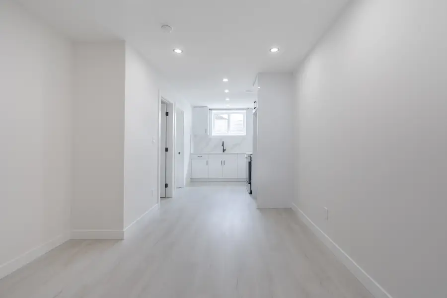 HavenNest legal basement suite interior — brand-new finishes, view 3