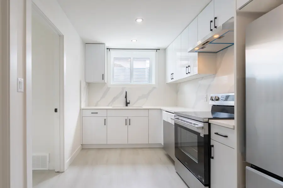 HavenNest legal basement suite interior — brand-new finishes, view 4