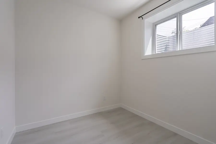 HavenNest legal basement suite interior — brand-new finishes, view 7