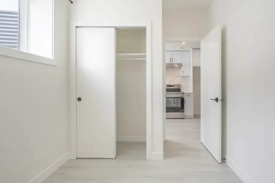 HavenNest legal basement suite interior — brand-new finishes, view 8