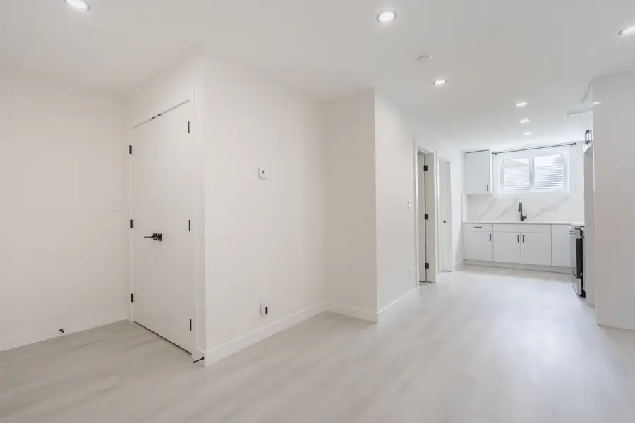 HavenNest legal basement suite interior — brand-new finishes, view 11