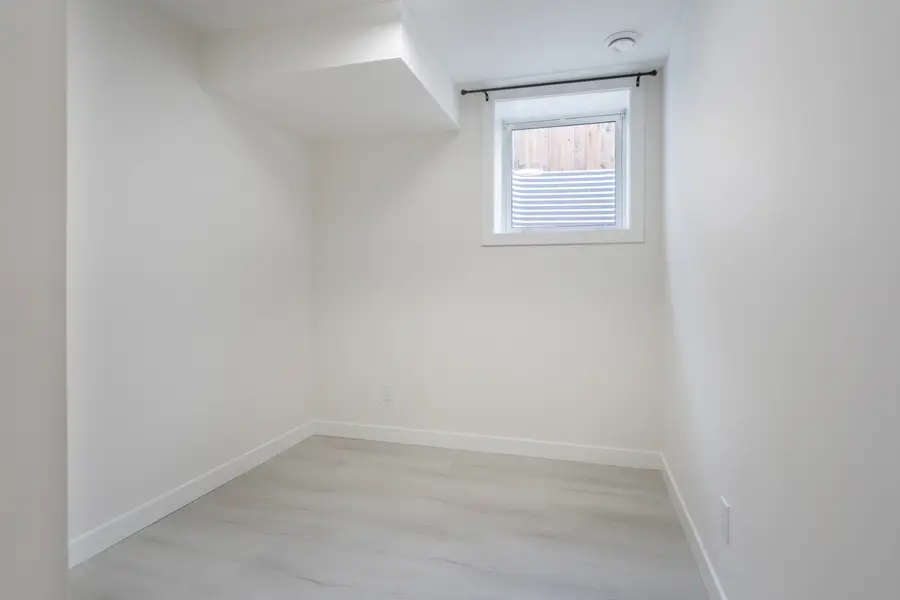 HavenNest legal basement suite interior — brand-new finishes, view 12