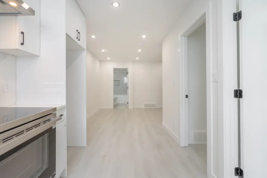 HavenNest legal basement suite interior — brand-new finishes, view 15