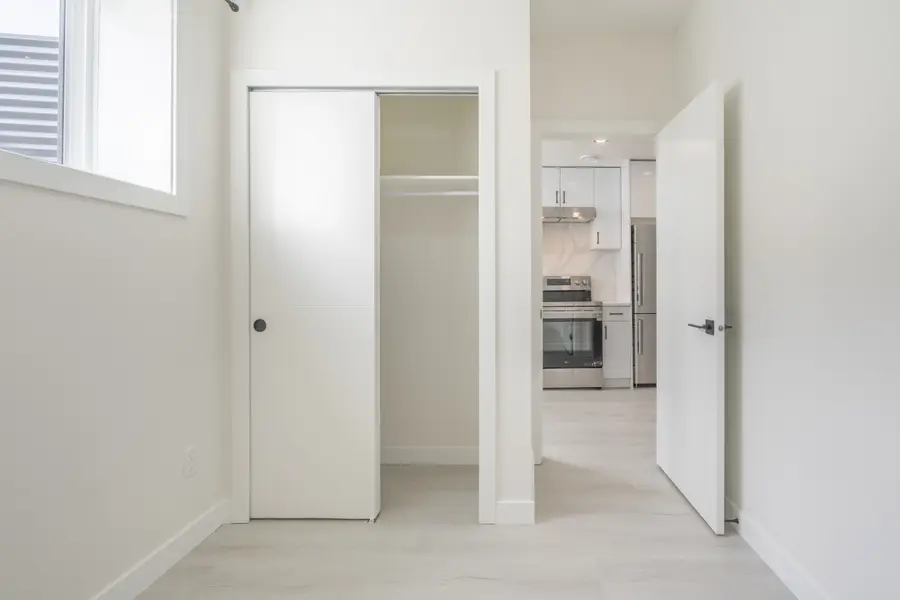 HavenNest legal basement suite interior — brand-new finishes, view 16